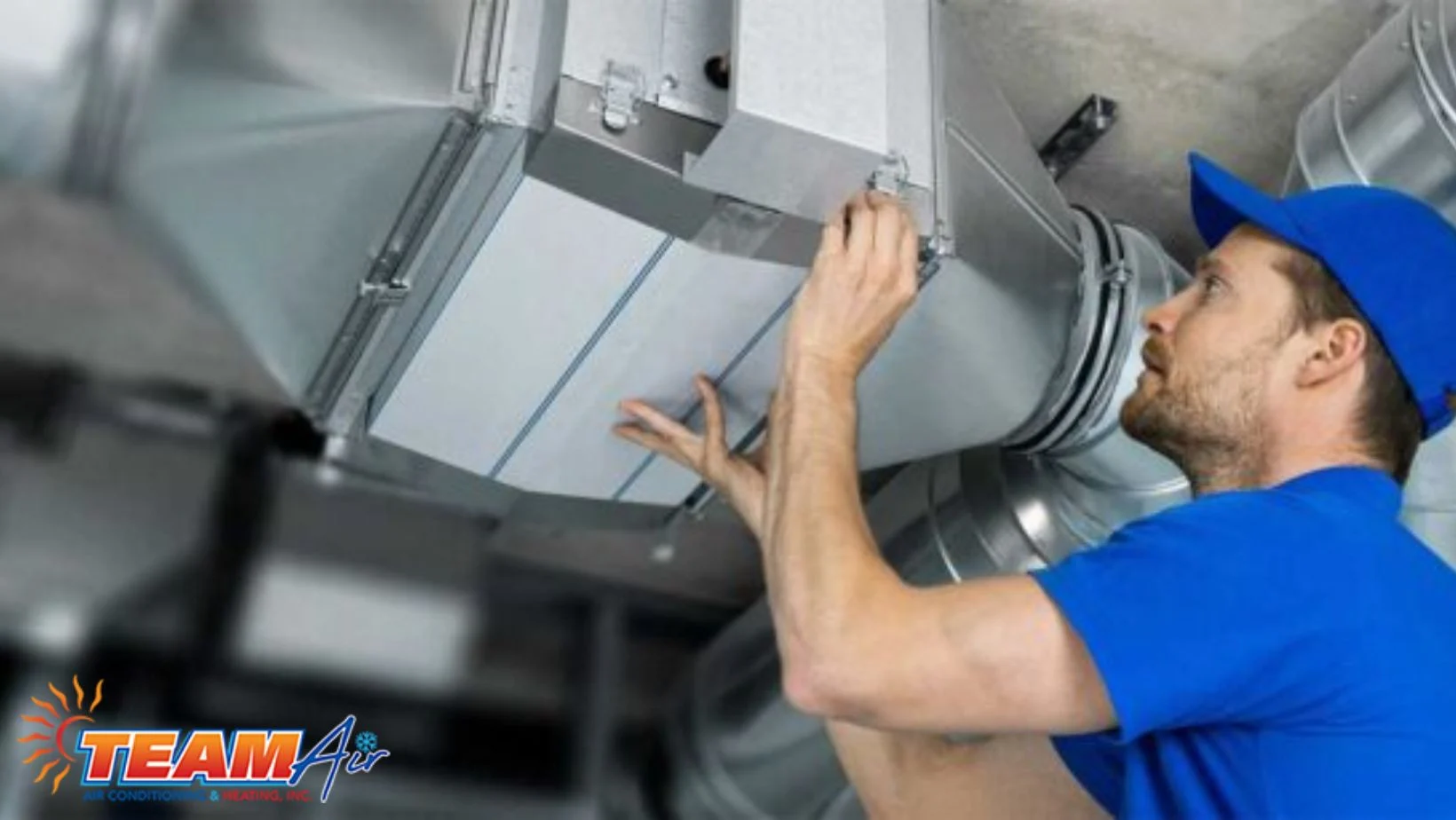 Business Duct Work Services Technician using specialized equipment to remove debris and reduce indoor air pollution, highlighting the benefits of air duct cleaning