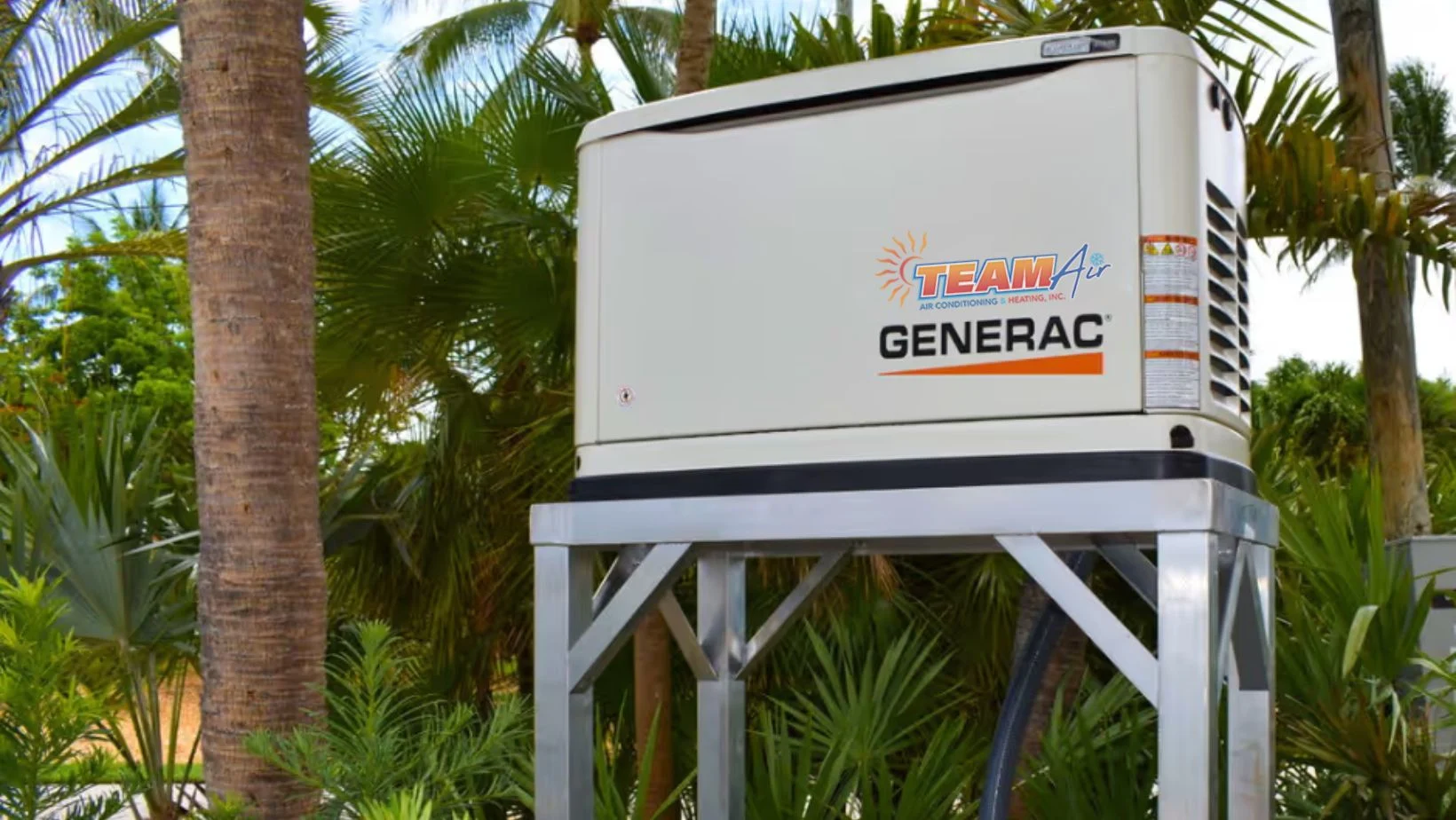 Team Air Conditioning & Heating technician proudly installing industry-leading Generac home generator